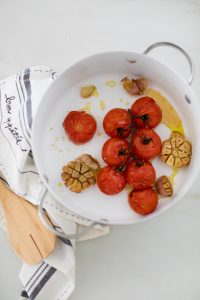 roasted tomatoes with garlic in pot