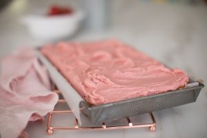 cake iced on rack
