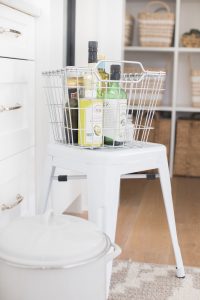 basket of cooking oils on a stool