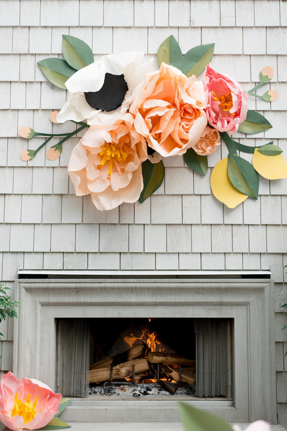 paper flower centre piece above Monika's outdoor fireplace 