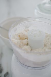 close up ingredients for cookie dough in food processor