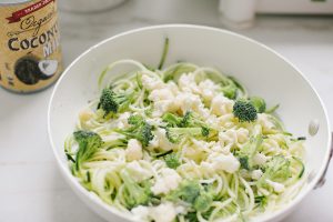 pasta in pan with broccoli and cauliflower florets