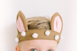 little boy with fawn ear headband