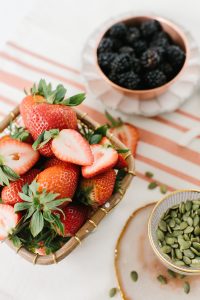 strawberries in a small basket