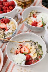 oats topped with blooms and fruit and nuts