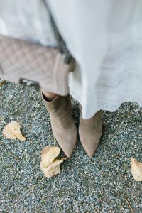 sued booties in fall leaves