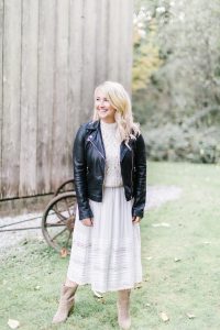 leather jacket and white lace dress