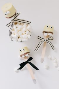 white spooky cocoa spoons with ribbon