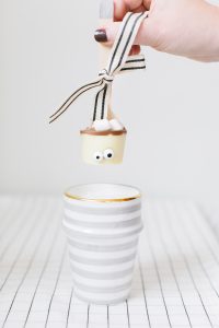 cute white cocoa spoon with eyes