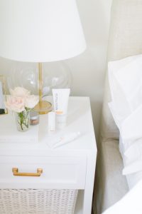 White nightstand with lamps