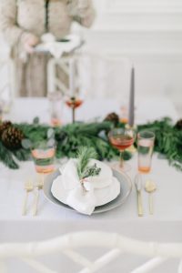Christmas place setting with copper and pine