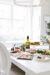 white airy kitchen with holiday appetizer spread