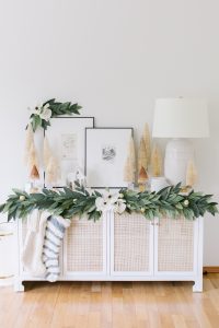 holiday paper garland on sideboard