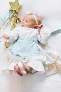 infant baby with a star wand