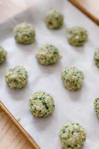 Loaded Green Chicken Meatballs Formed into Balls on Tray