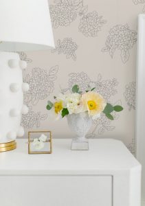 Nightstand with the Linden Lamp and the #MHxUrbanWalls Wallpaper in Hydrangeas in the Background