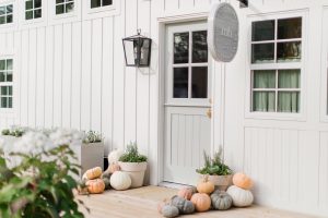 MH Tiny Home Front Door with Pumpkins