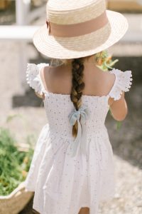 Lilly in sun dress and hat